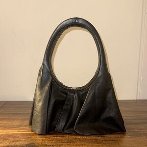 Luxury designer purse Coperni